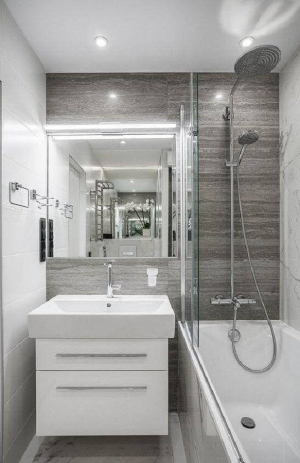 Phòng tắm nhỏ nhưng với việc sử dụng chất liệu kính sẽ góp phần giúp không gian thoáng đãng hơn